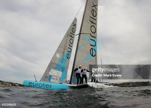 The Euroflex crew of Nathan Outteridge, Glenn Ashby and Lachie Gilmore celebrate winning the Grand Final during the Super Foilers Grand Prix at...