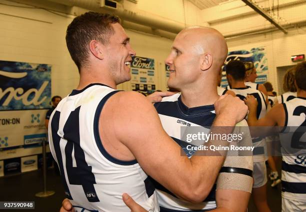 Joel Selwood and Gary Ablett of the Cats celebrate winning the round one AFL match between the Melbourne Demons and the Geelong Cats at Melbourne...