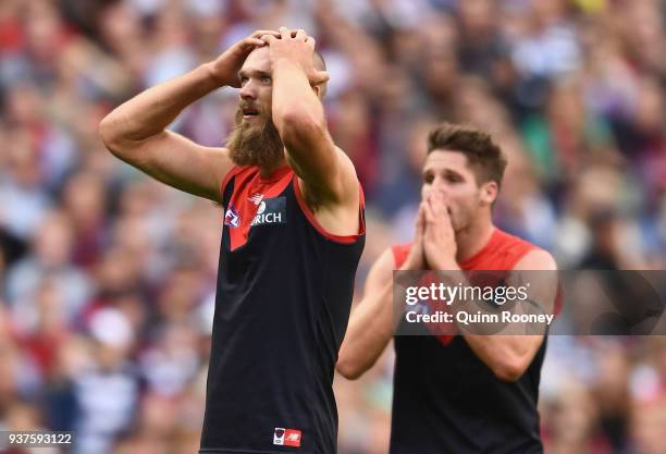 Max Gawn of the Demons reacts after missing a shot on goal during the round one AFL match between the Melbourne Demons and the Geelong Cats at...