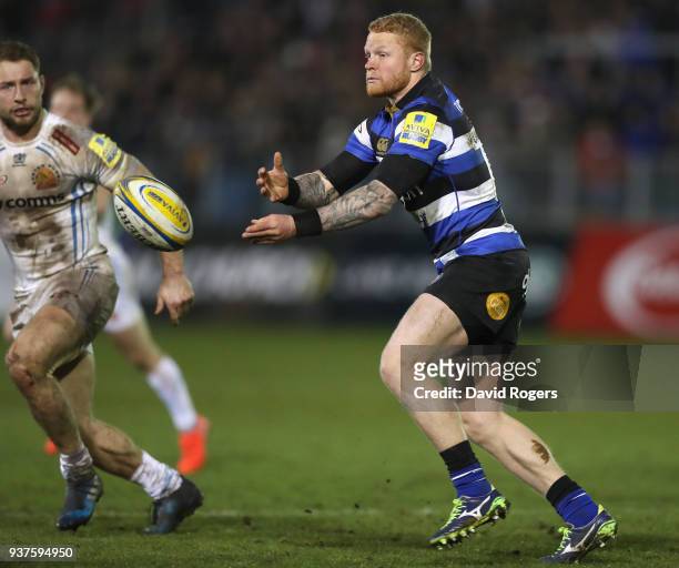Tom Homer of Bath passes the ball during the Aviva Premiership match between Bath Rugby and Exeter Chiefs at the Recreation Ground on March 23, 2018...