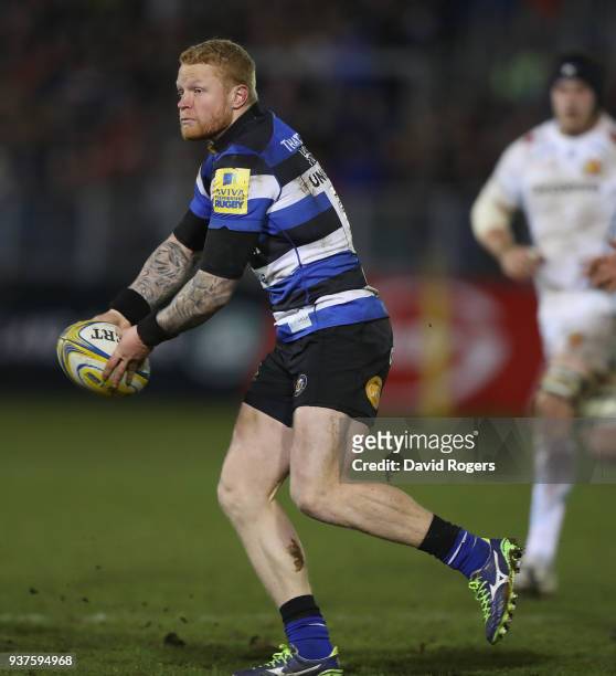 Tom Homer of Bath passes the ball during the Aviva Premiership match between Bath Rugby and Exeter Chiefs at the Recreation Ground on March 23, 2018...