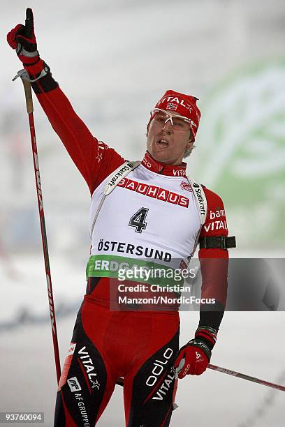 Emil Hegle Svendsen of Norway celebrates after winning the Men's 20 km Individual event in the E.ON Ruhrgas IBU Biathlon World Cup on December 3,...