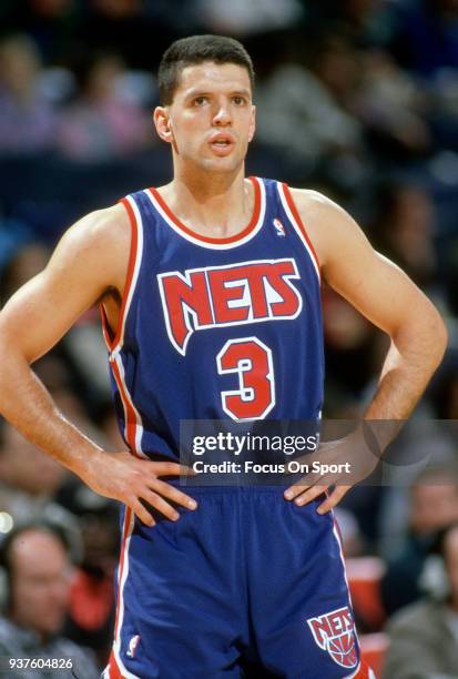 Drazen Petrovic of the New Jersey Nets looks on against the Washington Bullets during an NBA basketball game circa 1992 at the Capital Centre in...