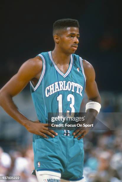 Kendall Gill of the Charlotte Hornets looks on against the Washington Bullets during an NBA basketball game circa 1991 at the Capital Centre in...