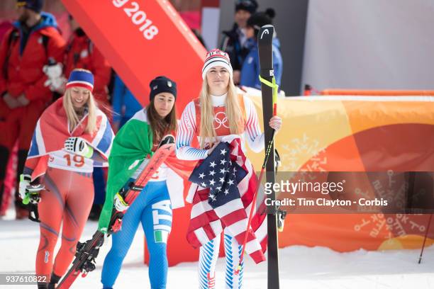 Bronze medal winner Lindsey Vonn of the United States, gold medal winner Sofia Goggia from Italy and silver medal winner Ragnhild Mowinckel of Norway...