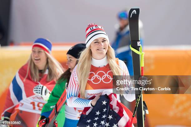 Bronze medal winner Lindsey Vonn of the United States, gold medal winner Sofia Goggia from Italy and silver medal winner Ragnhild Mowinckel of Norway...