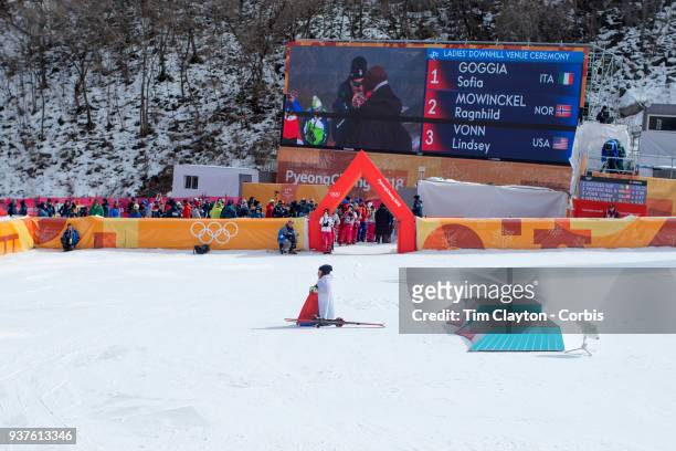 Gold medal winner Sofia Goggia of Italy takes a moment to reflect after the presentations during the Alpine Skiing - Ladies' Downhill race at...