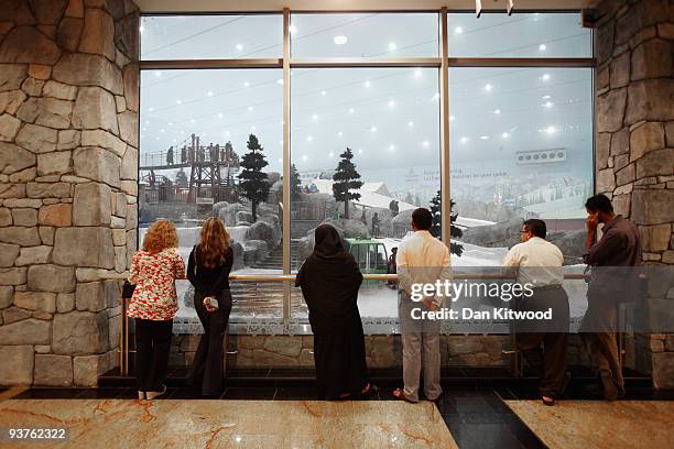 People enjoy the view of 'Ski Dubai,' a huge indoor Snow park on December 3, 2009 in Dubai, United Arab Emirates. Stock markets in the Dubai and Abu...