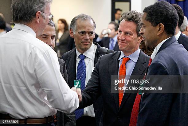 Google Chairman and CEO Eric Schmidt greets Treasury Secretary Timothy Geithner before the start of the Obama administration's Jobs and Economic...