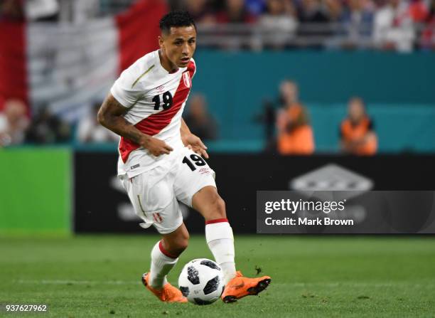 Yoshimar Yotun of Peru plays the ball during the international friendly match between Peru and Croatia at Hard Rock Stadium on March 23, 2018 in...