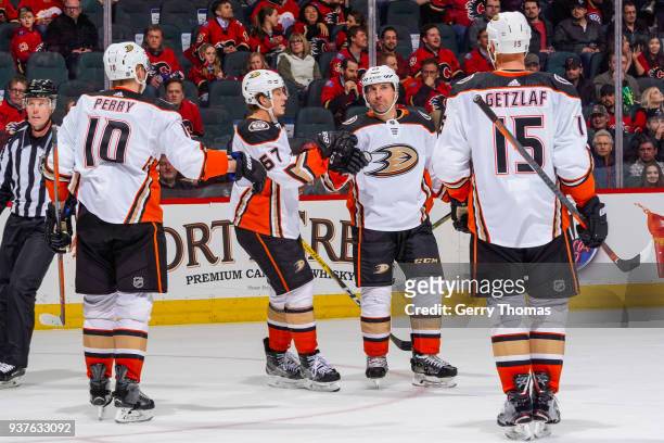 Francois Beauchemin, Rickard Rakell, Corey Perry and Ryan Getzlaf of the Anaheim Ducks celebrate in an NHL game on March 21, 2018 at the Scotiabank...