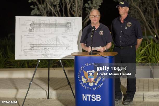 National Transportation Safety Board's Robert Sumwalt, left, and Robert Accetta hold a news conference regarding the collapse of the Florida...