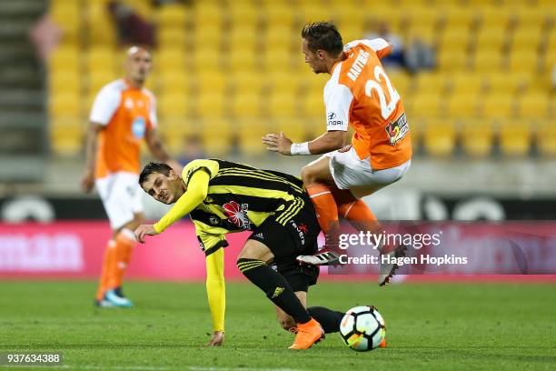 Matija Ljujic of the Phoenix collides with Eric Bautheac of the Roar during the round 24 A-League match between the Wellington Phoenix and the...