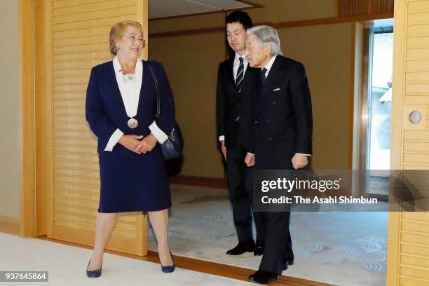 Chilean President Michelle Bachelet is escorted by Emperor Akihito prior to their meeting at the Imperial Palace on February 26, 2018 in Tokyo, Japan.