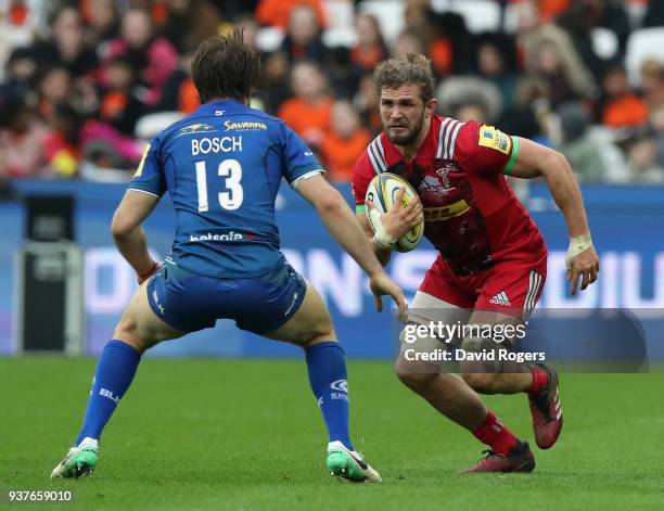 Luke Wallace of Harlequins takes on Marcelo Bosch during the Aviva Premiership match between Saracens and Harlequins at London Stadium on March 24,...