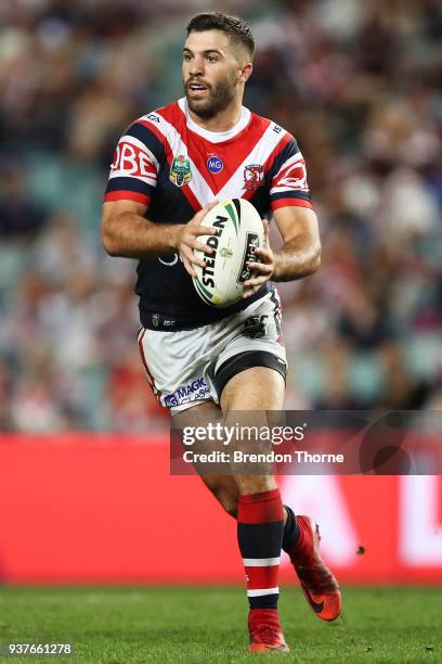 James Tedesco of the Roosters runs the ball during the round three NRL match between the Sydney Roosters and the Newcastle Knights at Allianz Stadium...