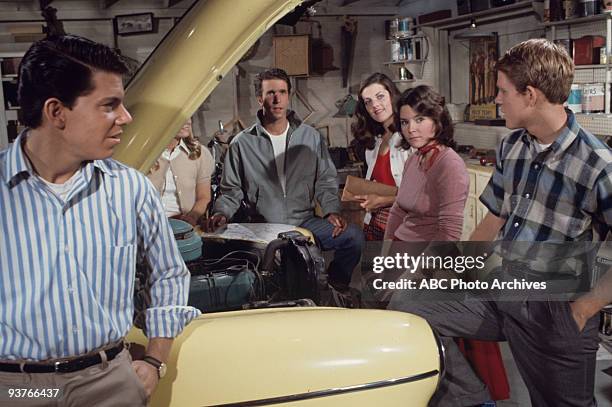 Open House" - Season Two - 5/28/74 The cast stands around a yellow car with the hood up, Potsie , Richie Fonzie