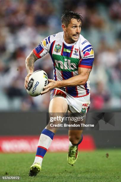 Mitchell Pearce of the Knights runs the ball during the round three NRL match between the Sydney Roosters and the Newcastle Knights at Allianz...