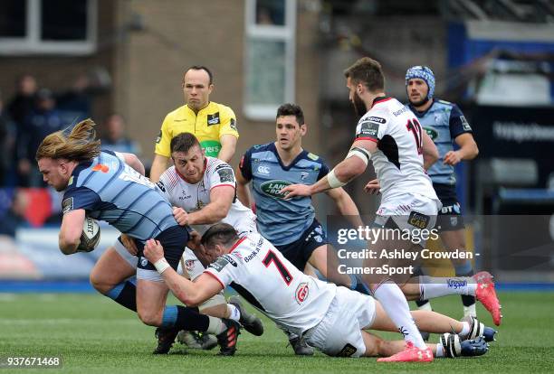 Cardiff Blues' Kristian Dacey is tackled by Ulster Rugbys Clive Ross during the Guinness PRO14 Round 18 match between Cardiff Blues and Ulster Rugby...