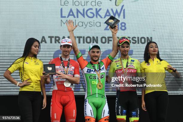 Silver medalist Manuel Belletti of Androni Giocattoli-Sidermec Italy, gold medalist Andrea Guardini of Bardiani CSF Italy, and bronze medalist Luca...