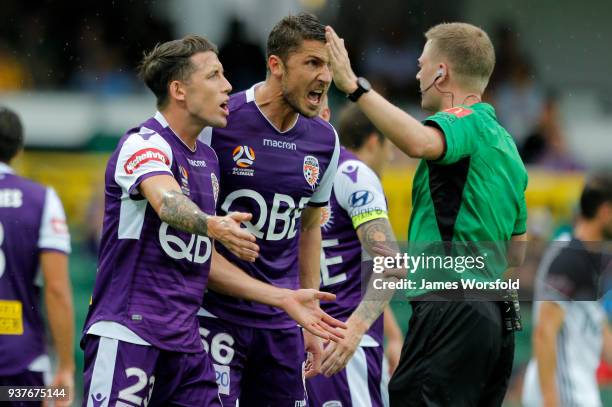 Dino Djulbic and Scott Neville react to field referee Adam Fielding during the round 24 A-League match between the Perth Glory and the Melbourne...