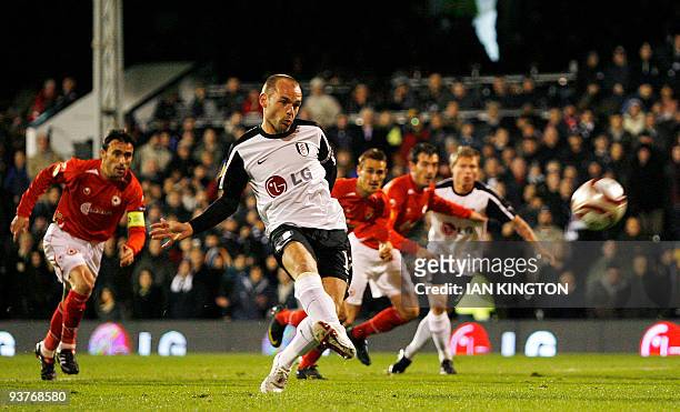Fulham's Danny Murphy shoots but misses a penalty shot against CSKA Moscow during a Europa League Group E football match at Craven Cottage in London...