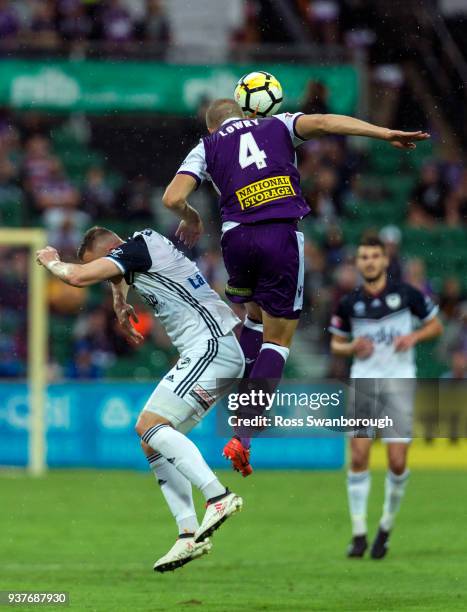 Shane Lowry of the Glory gets the better of Besart Berisha of the Victory during the A-League Rd 24 match between Perth and Melbourne Victory at nib...