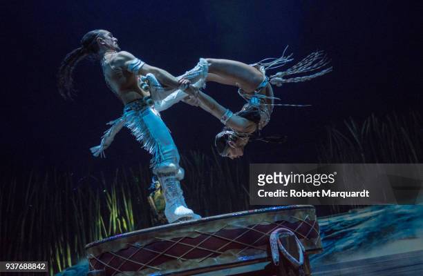 Massimiliano Medini and Denise Garcia Sorta perform on stage for the Cirque du Soleil 'Totem' show on March 22, 2018 in Barcelona, Spain.