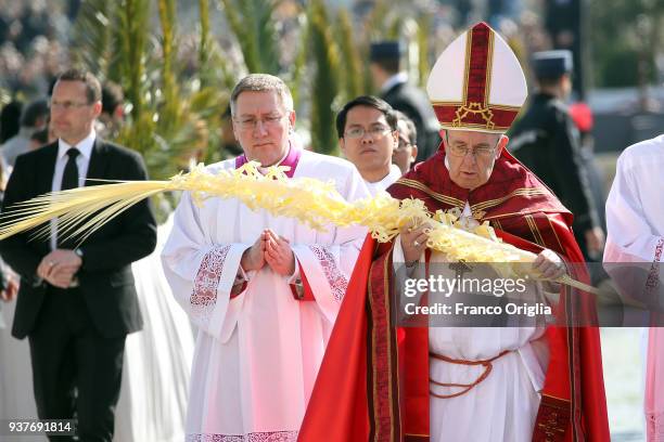 Pope Francis arrives in procession at St. Peter's Square during the Palm Sunday Mass on March 25, 2018 in Vatican City, Vatican. Pope Francis on...