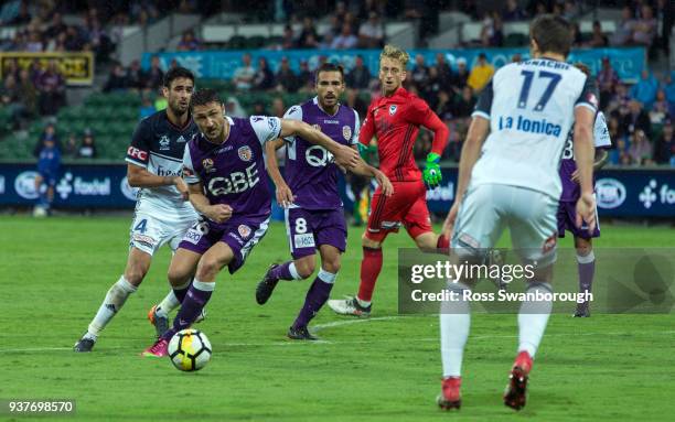 Dino Djulbic of the Glory runs at James Donachie of the Victory during the round 24 A-League match between the Perth Glory and the Melbourne Victory...