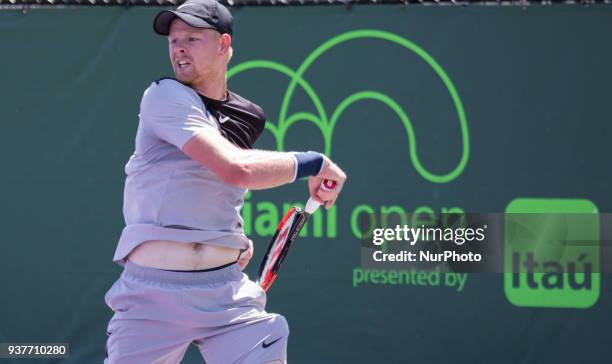 Kyle Edmund, from Great Britain, in action against Frances Tiafoe, from the USA, playing for the second round match at the Miami Open on March 24,...