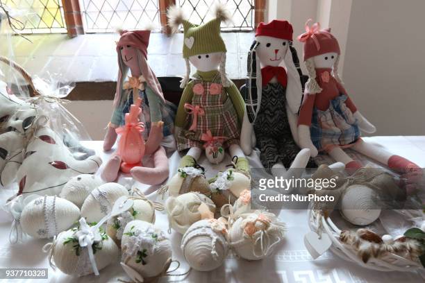 Hand made Easter eggs are seen in Pelplin, Poland on 25 March 2018 People attend the Easter market during the Palm Sunday in the Cistercian monastery...