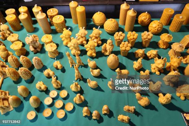 Hand made candles made of beeswax is seen in Pelplin, Poland on 25 March 2018 People attend the Easter market during the Palm Sunday in the...