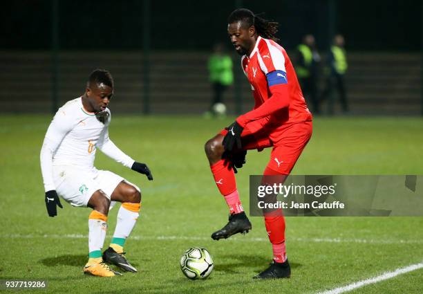 Emmanuel Adebayor of Togo, Jean Michael Seri of Ivory Coast during the international friendly match between Togo and Ivory Coast at Stade Pierre...