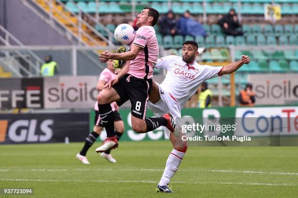 Anibal Capela of Carpi fouls Mato Jajalo of Palermo during the serie B match between US Citta di Palermo and Carpi FC at Stadio Renzo Barbera on...