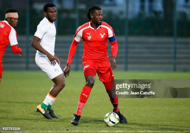 Emmanuel Adebayor of Togo, Jean Michael Seri of Ivory Coast during the international friendly match between Togo and Ivory Coast at Stade Pierre...