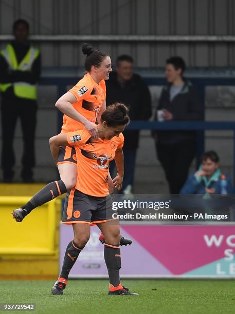 Reading Women's Fara Williams celebrates scoring her side's second goal of the game with Jade Moore during the FA Women's Super League match at the...