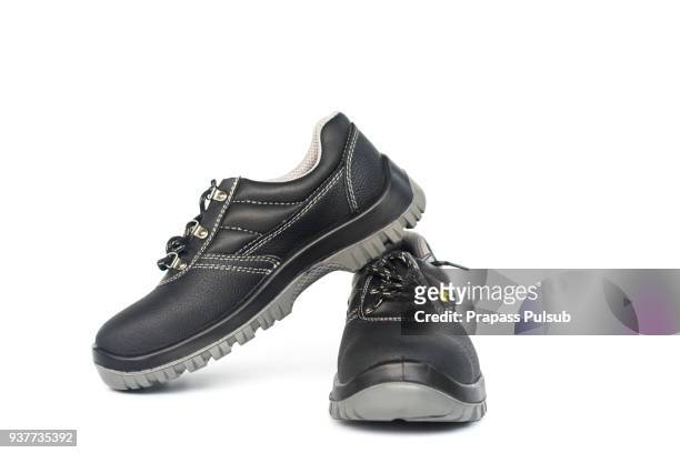 safety shoe black work boots on white background - black boot fotografías e imágenes de stock