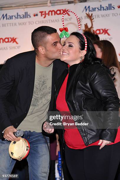 Actors Mark Salling and Nikki Blonsky attend the "Carol-Oke" Contest at Bryant Park on December 3, 2009 in New York City.