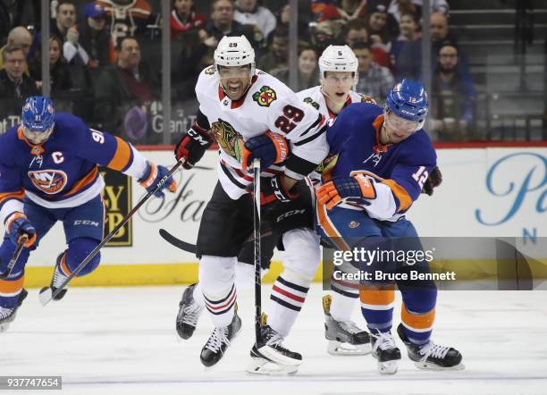 Andreas Martinsen of the Chicago Blackhawks skates against the New York Islanders at the Barclays Center on March 24, 2018 in the Brooklyn borough of...