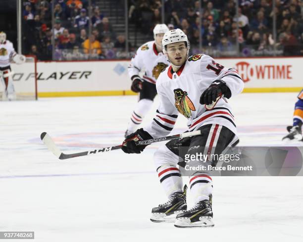Alex DeBrincat of the Chicago Blackhawks skates against the New York Islanders at the Barclays Center on March 24, 2018 in the Brooklyn borough of...