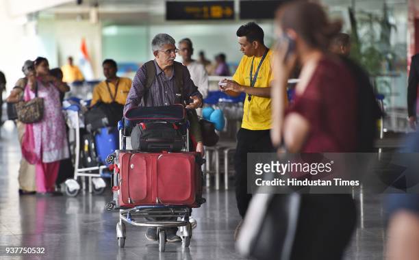 Indigo Employees and volunteers assist to the passengers after IndiGo and SpiceJet airlines have partially moved their operations from T1 to the...