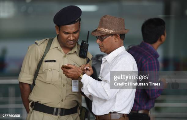 Passenger enquires from CISF Jawan after IndiGo and SpiceJet airlines have partially moved their operations from T1 to the newly revamped T2 on...