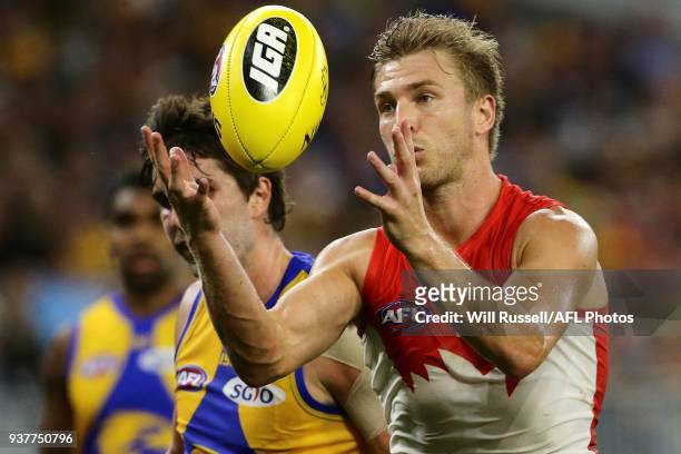 Kieren Jack of the Swans marks the ball during the round one AFL match between the West Coast Eagles and the Sydney Swans at Optus Stadium on March...