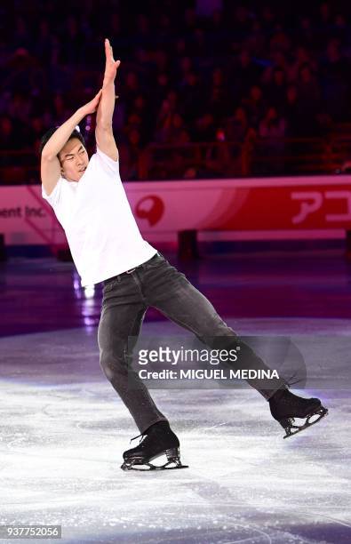 Nathan Chen of the US performs a routine during an Exhibition Gala at The World Figure Skating Championships 2018 in Milan on March 25, 2018. / AFP...