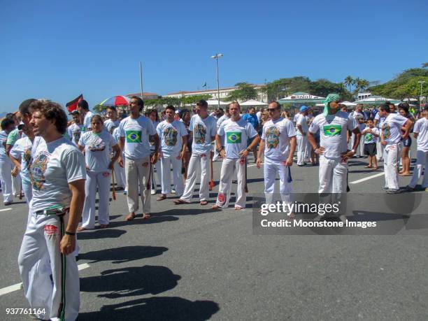 capoeira on copacabana beach, rio de janeiro - exhibition a human adventure stock pictures, royalty-free photos & images