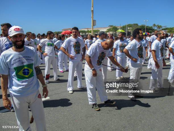 capoeira on copacabana beach, rio de janeiro - exhibition a human adventure stock pictures, royalty-free photos & images