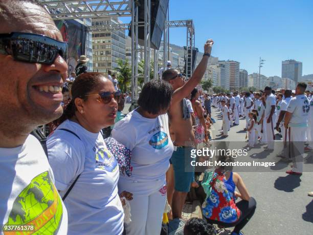 capoeira on copacabana beach, rio de janeiro - exhibition a human adventure stock pictures, royalty-free photos & images