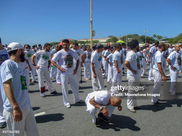 capoeira on copacabana beach, rio de janeiro - exhibition a human adventure stock pictures, royalty-free photos & images