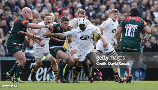 Christian Wade of Wasps breaks past George Ford during the Aviva Premiership match between Leicester Tigers and Wasps at Welford Road on March 25,...